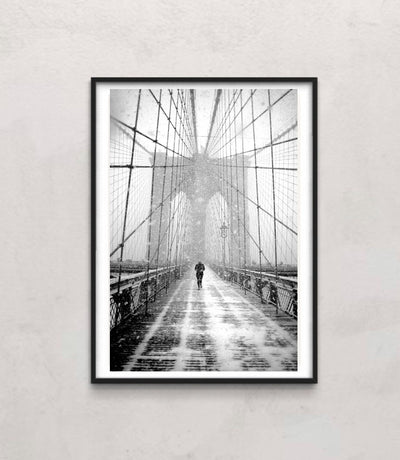 New York Walker in Blizzard - Brooklyn Bridge