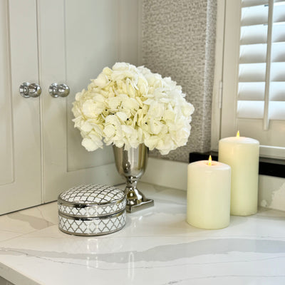 White Hydrangeas In Metal Goblet Vase