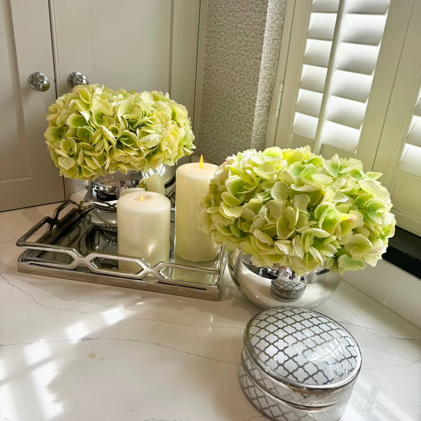 Green Hydrangeas in Mirrored Fishbowl Vase